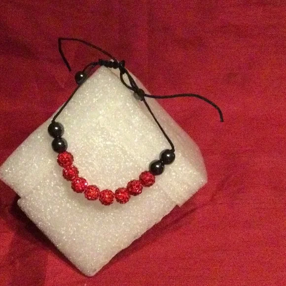 8 Coloured Bracelets - Picture 15 of 16